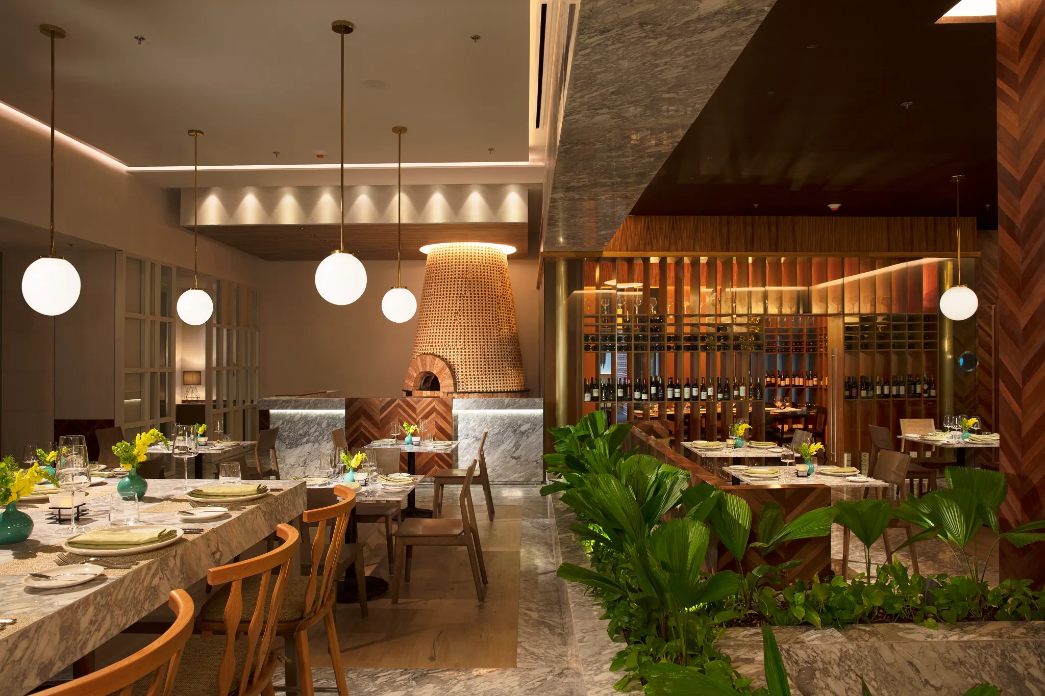 Portofino Italian restaurant at Dreams Vista Cancun featuring elegant dining, wood-fired pizza oven, and classic Italian dishes in a modern setting.
