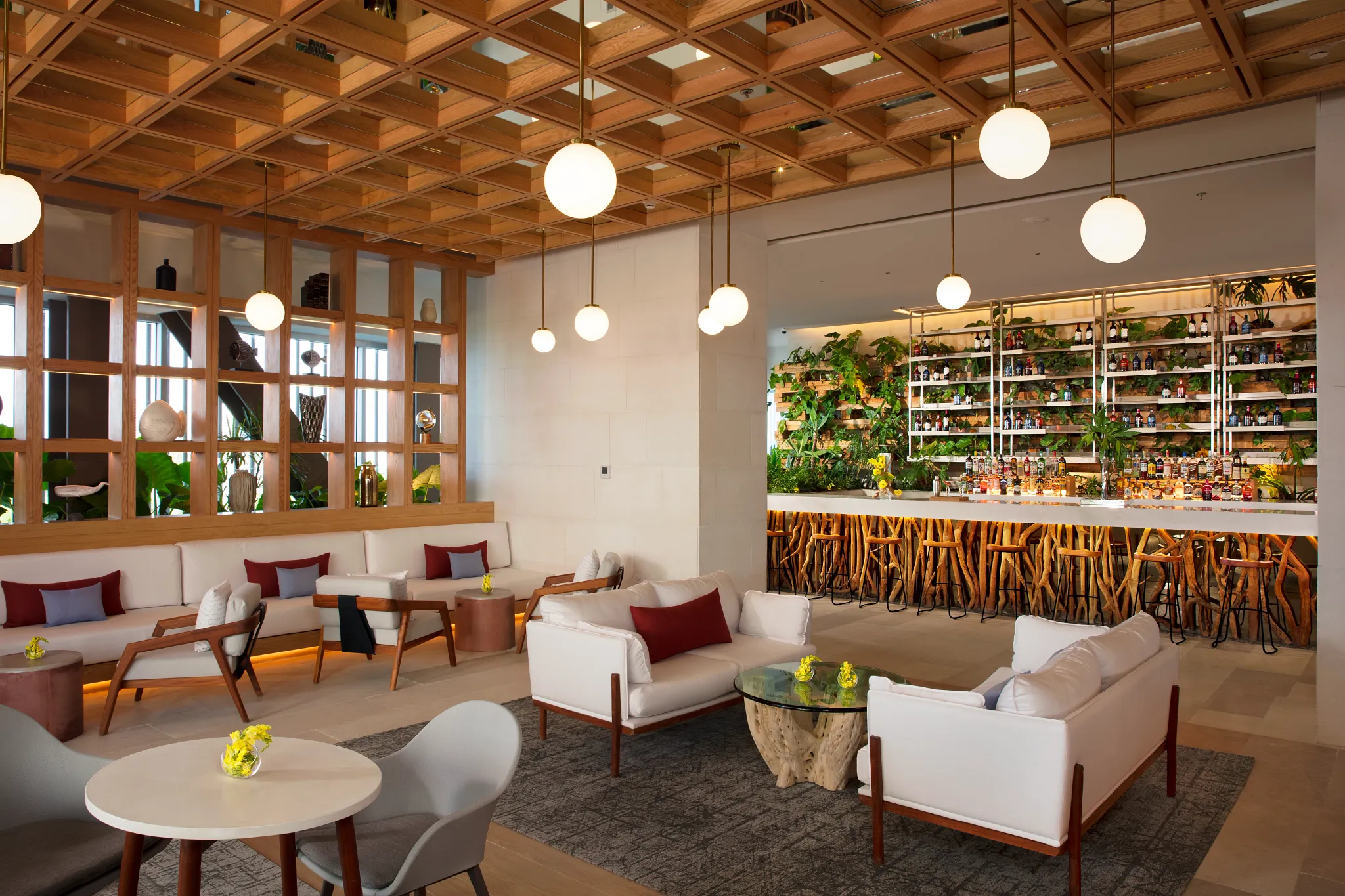 Rendezvous Lobby Bar at Dreams Vista Cancun featuring stylish seating, signature cocktails, and scenic lobby views.