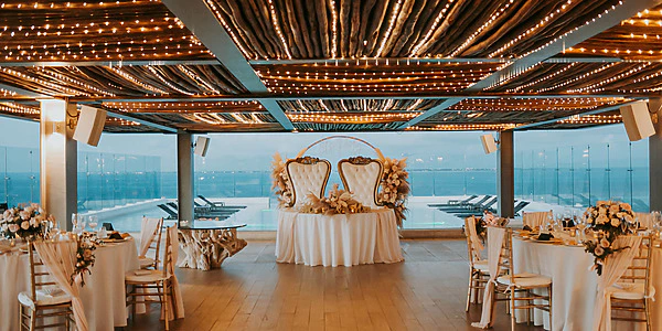 Rooftop venue with infinity pool and ocean views at Dreams Vista Cancun Golf & Spa Resort