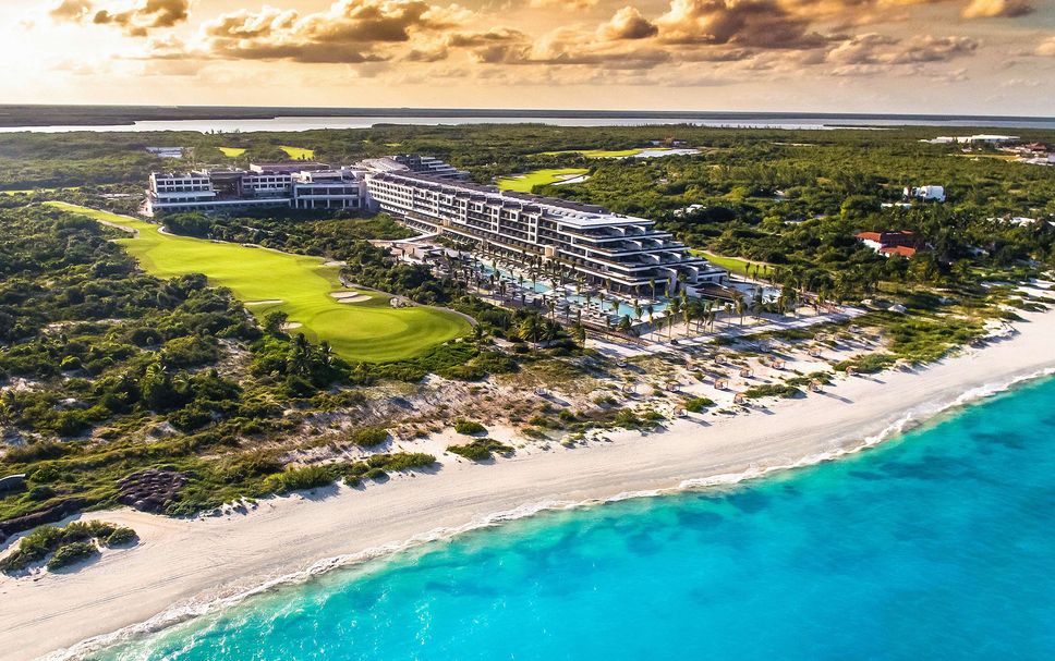 ATELIER Playa Mujeres adults-only luxury all-inclusive resort with infinity pools, contemporary design, and pristine beach in Playa Mujeres, Mexico.