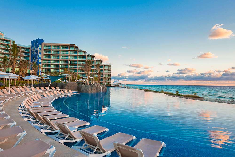 Hard Rock Hotel Cancun all-inclusive resort with beachfront pools, rock-and-roll theming, and vibrant entertainment in Cancun's Hotel Zone.
