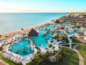 Moon Palace Cancun mega all-inclusive resort with expansive pools, water park, and beachfront views on Mexico's Caribbean coast.