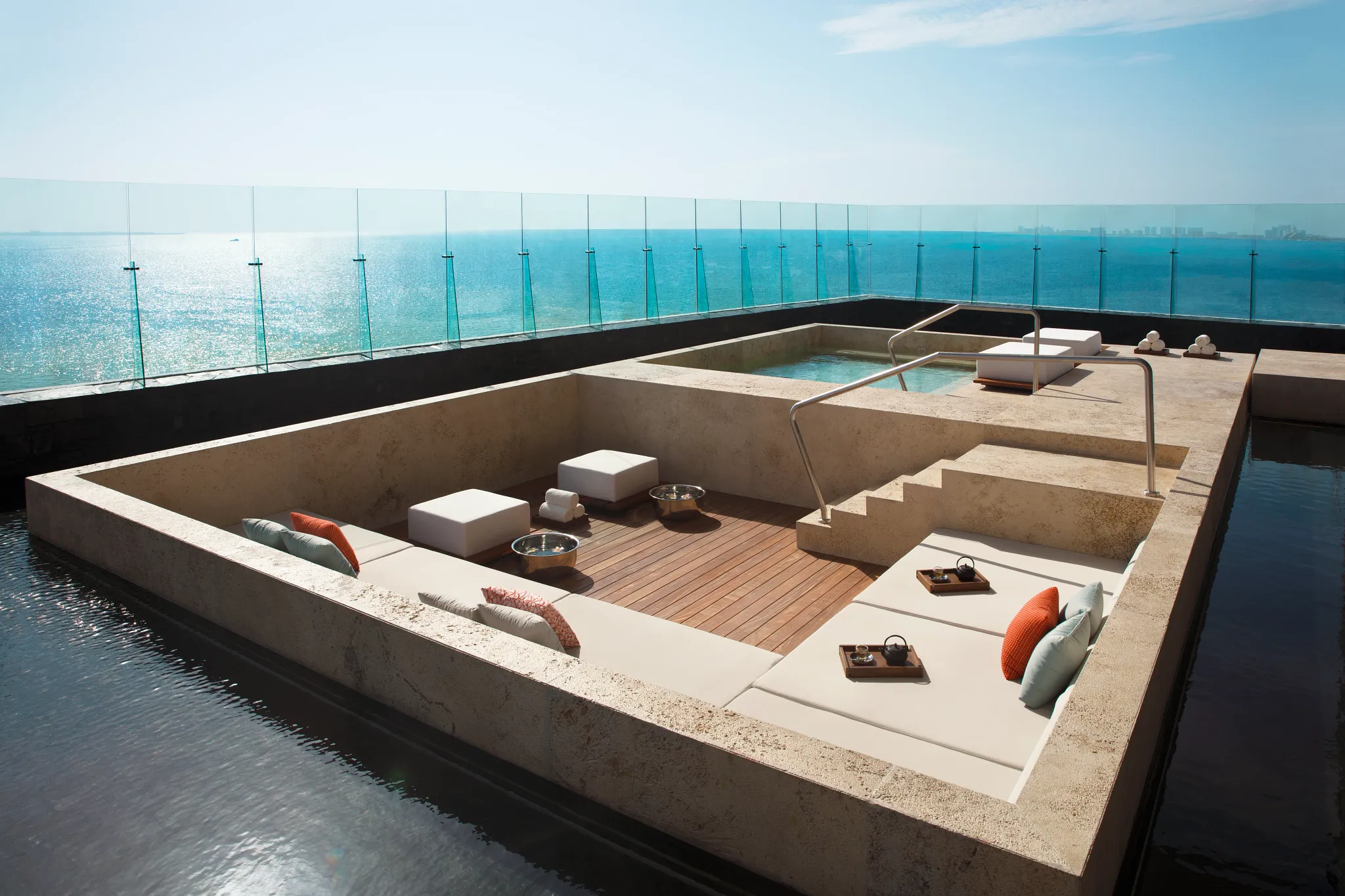 Rooftop spa terrace with ocean views and relaxation tubs at Dreams Vista Cancun Golf & Spa Resort.