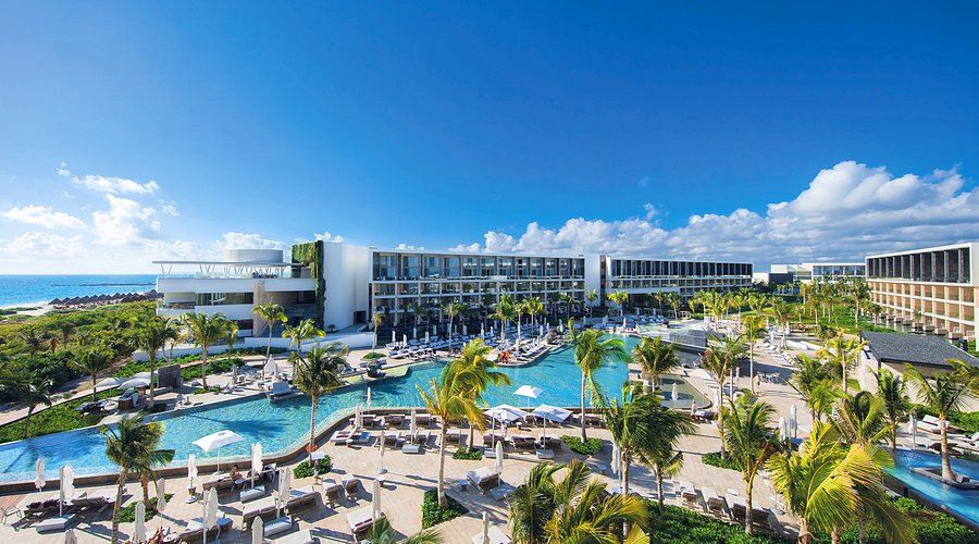 TRS Coral Hotel adults-only all-inclusive resort in Costa Mujeres with luxury pools, oceanfront suites, and premium service.